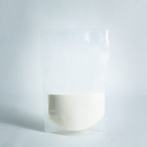 A clear plastic pouch filled halfway with Agar Mix MYAG Antibacterial Malt Extract Yeast powder stands upright against a plain white background.
