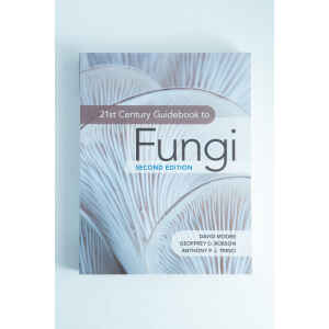 Book cover of 21st Century Guide to Fungi: Book by David Moore ft, others with close-up of mushroom gills—a great addition to any mushroom guide or Australian mushrooms book collection.