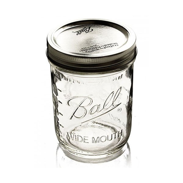 The Ball mason pint jars wide mouth set of 6 features clear, durable, autoclavable glass with metal lids and embossed fronts. Perfect for preserving or storage.