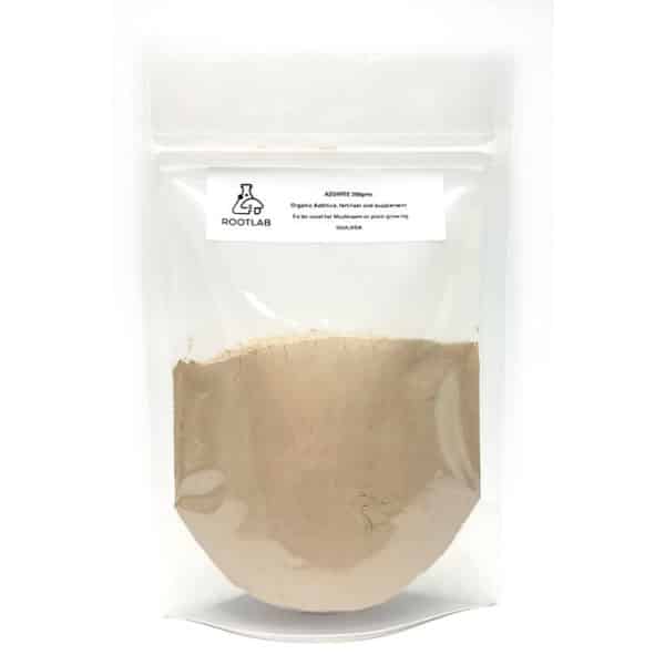A clear pouch filled with light brown powder labelled as organic azomite fertiliser and supplement.