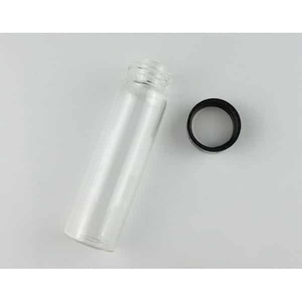A Clear Borosilicate Reagent Lab Glass bottle 50ml from the 10pcs set is shown lying next to a black screw cap on a white surface.