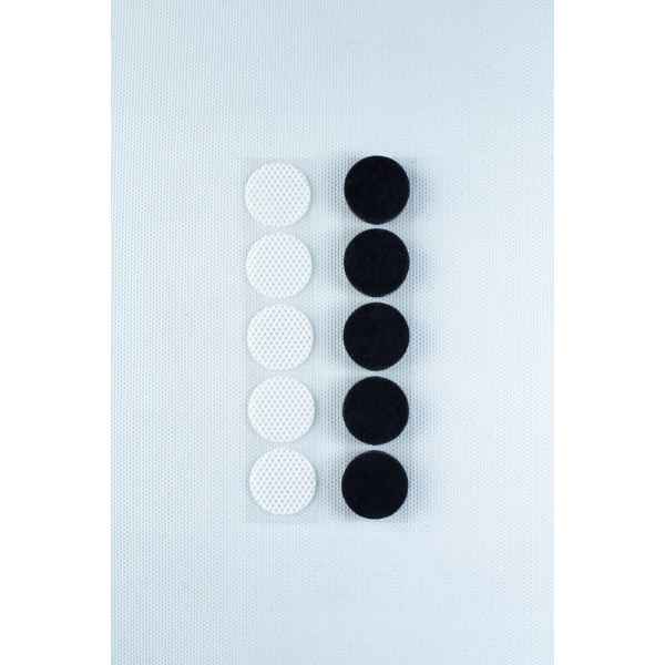 Six white and six black circles, resembling the Self-healing injection port & Air Vent Filter-3M, are arranged in two vertical lines on a white textured background.