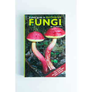 The cover of A Field Guide to Australian Fungi Book by Bruce Fuhrer features two vivid red-capped mushrooms—an essential reference for anyone building a mycology book collection.