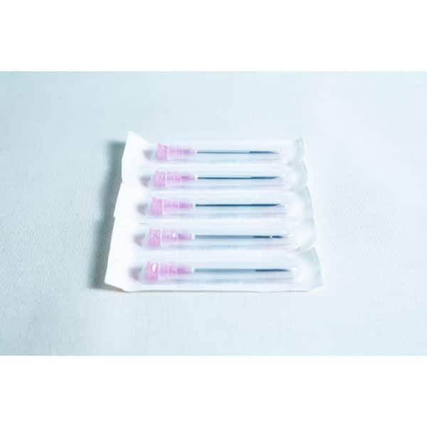 A box of 100 sterile 18G hypodermic needles, each with a pink cap and individually wrapped, is displayed on a white surface.