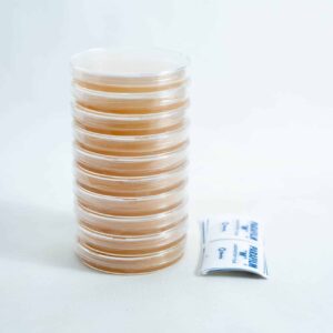 A stack of pre-poured MEAG agar plates (antibacterial) 90mm is placed next to two small packets on a white background.