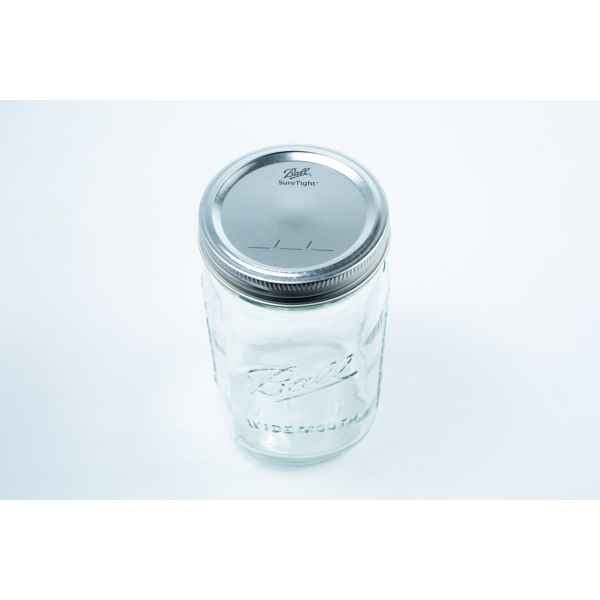 Set of 12 Ball mason jars, 1 litre each, with metal lids, shown on a white background. These classic autoclavable glass jars are ideal for safe storage, preserving, and sterilisation.