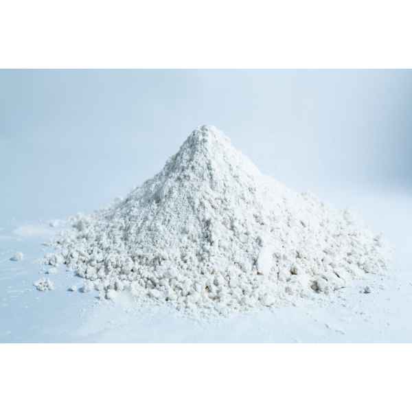 A small mound of Brown Rice Flour 5kg Organic Food Grade on a white surface with a light background.
