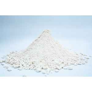A small mound of fine, off-white Liquid Culture Pre-mix | DLME | Now Extra Clear powder rests on a light surface with a plain background.