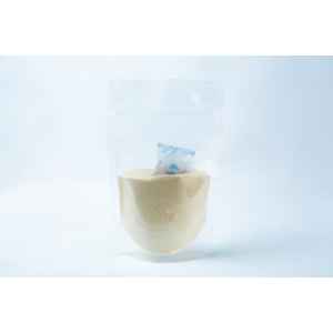 A transparent pouch of Liquid Culture Pre-mix | DLME | Now Extra Clear, containing light yellow dextrose and light malt extract powder, with a small silica gel sachet inside.