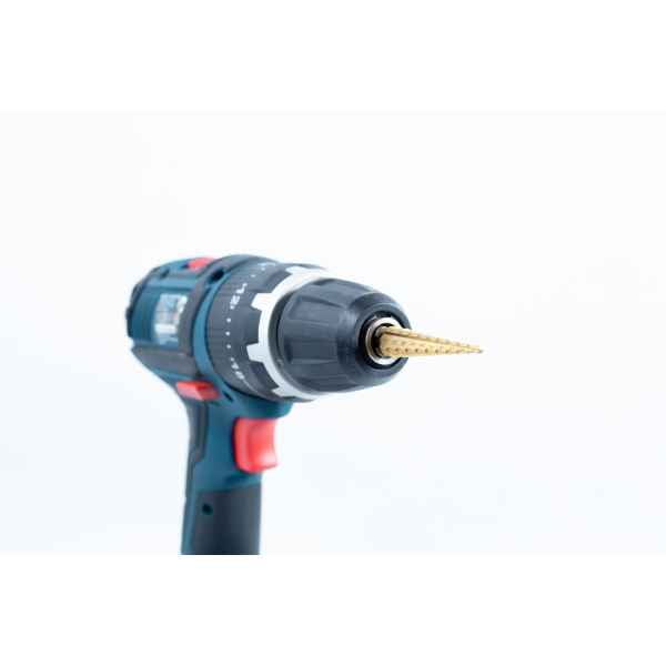 A Drill Bit for holes size 3mm-12mm Titanium Coated is attached to a cordless power drill, displayed against a white background.
