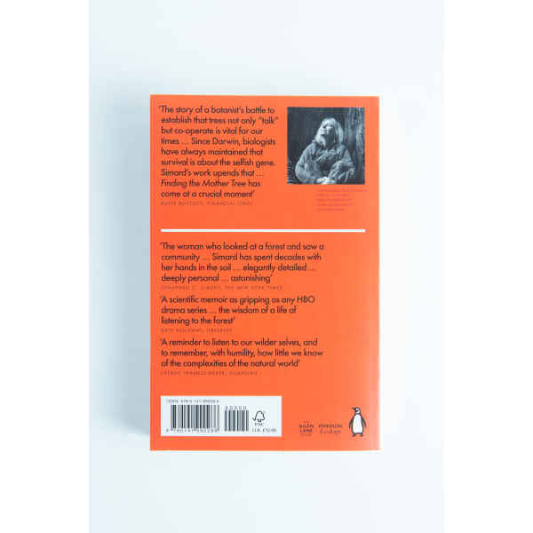 Back cover of Finding the Mother Tree by Suzanne Simard features reviews, a barcode, and a small black-and-white author photo on an orange background—ideal for fans of mushroom books.