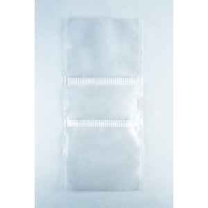 Three empty Unicorn Mushroom Grow Bags for spawn and substrate, made of transparent plastic with horizontal seals, are laid flat on a white background.