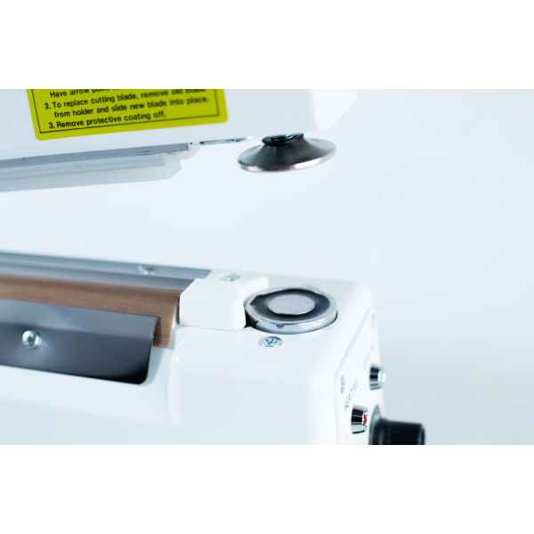 Close-up of the Heat Sealer 30cm Seal Width 5mm with cutter and magnet, highlighting its metal and plastic parts against a plain background.