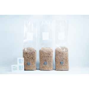 Three 1kg Organic Brown Rice Flour (BRF) & Vermiculite bags for PF Tek sit beside two silica gel sachets on a white background.