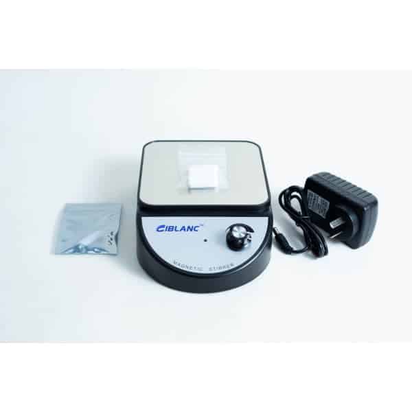 The Magnetic Stirrer Ciblanc 3500rpm is shown on a white background with a power adaptor and a small bag containing a magnetic stir bar.