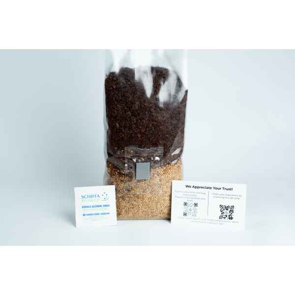 A clear 1kg Masters Mix + Millet All-in-one Mushroom Bag filled with brown and yellow seeds, shown with two small info cards in front.