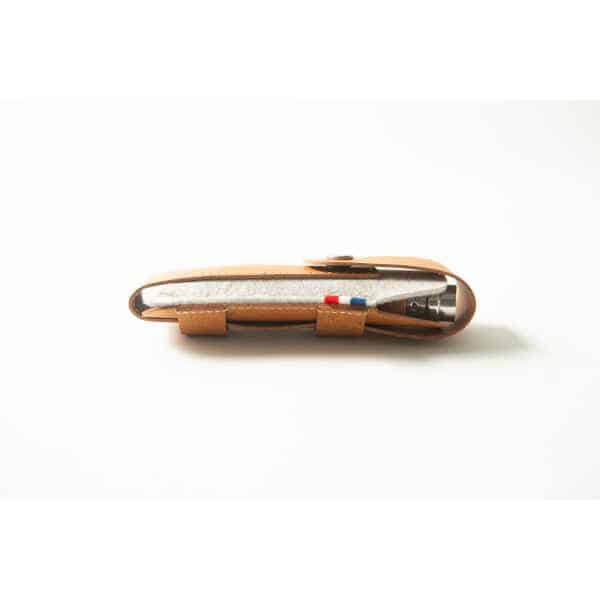 A brown Opinel Sheath - Brown leather pen case with a grey fabric pouch and a pen inside, shown on a white background.