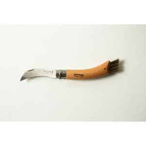 The Opinel No 8 Folding Mushroom Knife features a stainless steel blade, a beechwood handle, and a small brush—ideal for foraging and cleaning mushrooms.