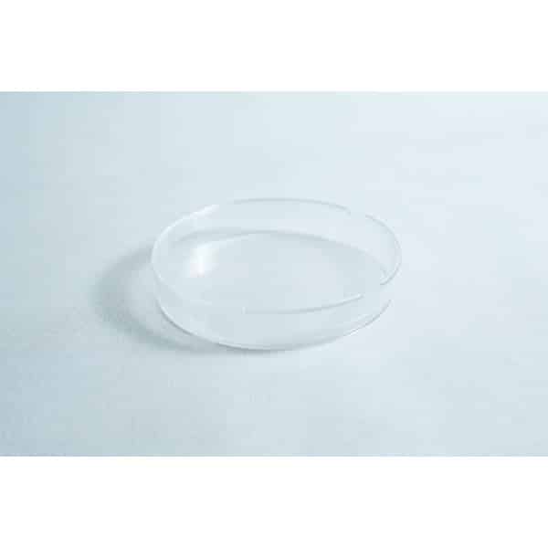 A clear, sterile 90mm Petri dish with 3 vents, gamma irradiated for laboratory use, sits empty on a white surface, highlighting its simplicity.