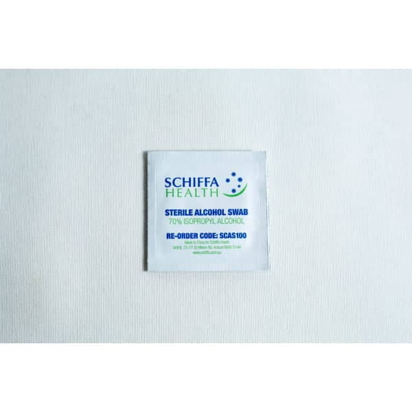 A box of 100 Sterile Alcohol Wipes / Swabs / Pads sits on a white surface.