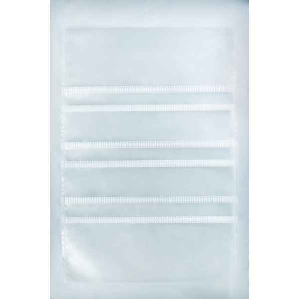 A clear plastic sheet with four horizontal pocket strips, perfect for organising supplies like Mushroom Grow Bags Unicorn for spawn and substrate or other mushroom grow bag essentials.