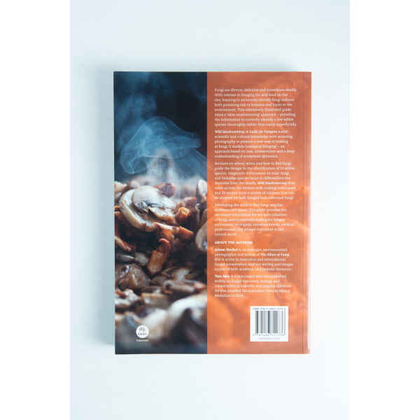 Back cover of Wild Mushrooming: A Guide for Foragers Book by Alison Pouliot and Tom May, showing steaming cooked mushrooms and text about fungi and this expert foraging guide.