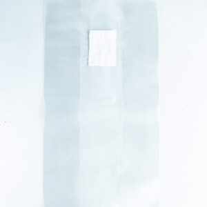 A small white square sits on a large transparent sheet made of material used in Mushroom Grow Bags Unicorn for spawn and substrate, all placed on a white background.