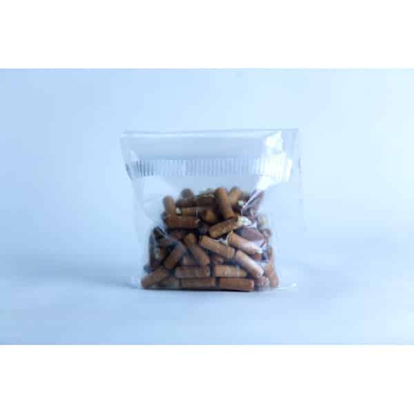 A clear plastic bag of Log Dowel Mushroom Plug Spawn (Ganoderma steyaertanum), Native Australian Reishi, is shown against a light blue background.