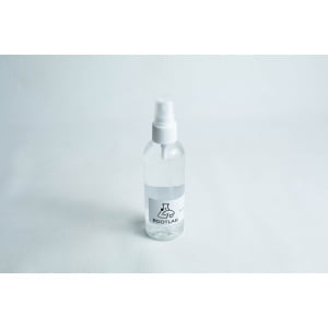 A clear 100ml spray bottle labelled ROOTLAB with a laboratory flask logo, containing 70% isopropyl alcohol, is placed on a white background.