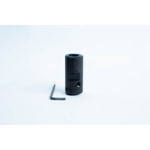 A black metal cylinder with a hole, next to a small L-shaped hex key on a white background.