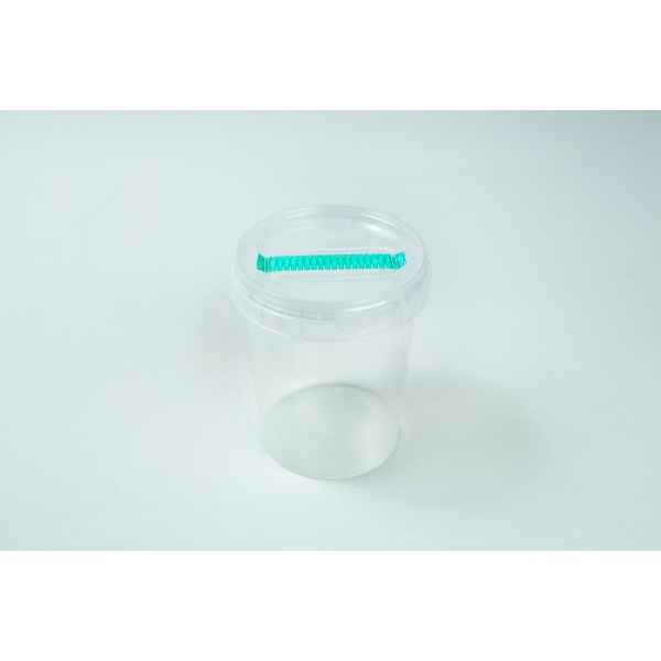 The Cordyceps militaris Mushroom Grow Kit is a clear plastic container with a transparent lid and a green object attached to the top for easy mushroom cultivation.