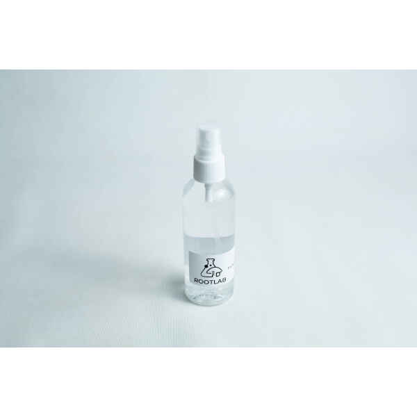 Clear plastic spray bottle labelled ROOTLAB filled with liquid, ideal for use with your Monotub Mushroom Growing Kit-Premium, shown on a white surface.