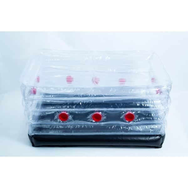 A clear inflatable plastic box with red caps and a black base, set against a white background.