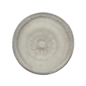 Round ceramic plate with a grey, textured, and slightly gradient pattern viewed from above.