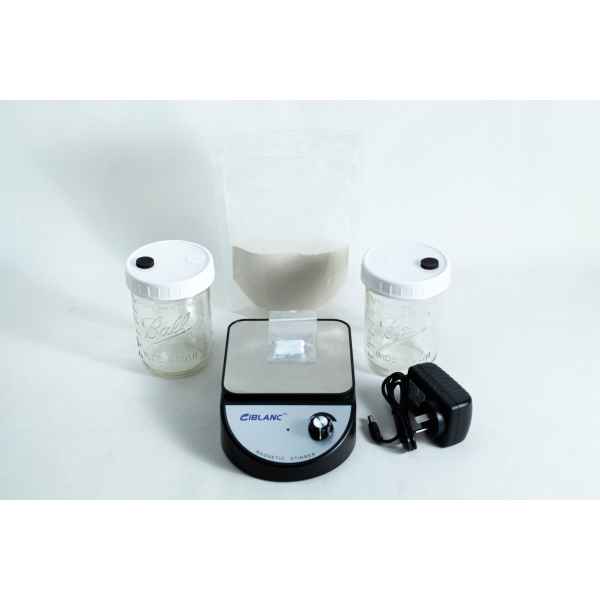 The Liquid Culture Kit with Jar, Magnetic Stirrer and LC Mix includes two jars, a clear pouch of LC mix powder, a magnetic stirrer, and a power adaptor—all shown on a white background.