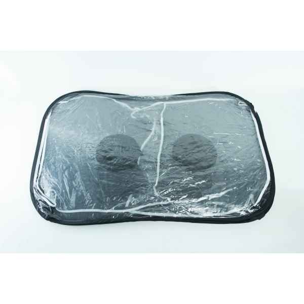 A transparent storage bag with black trim containing two black round objects.