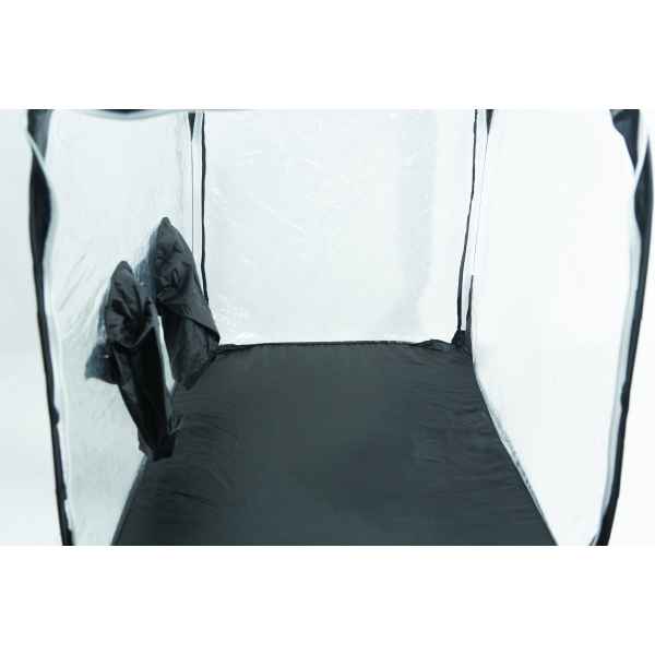 Interior of an empty grow tent with reflective walls and two vents on the left side.