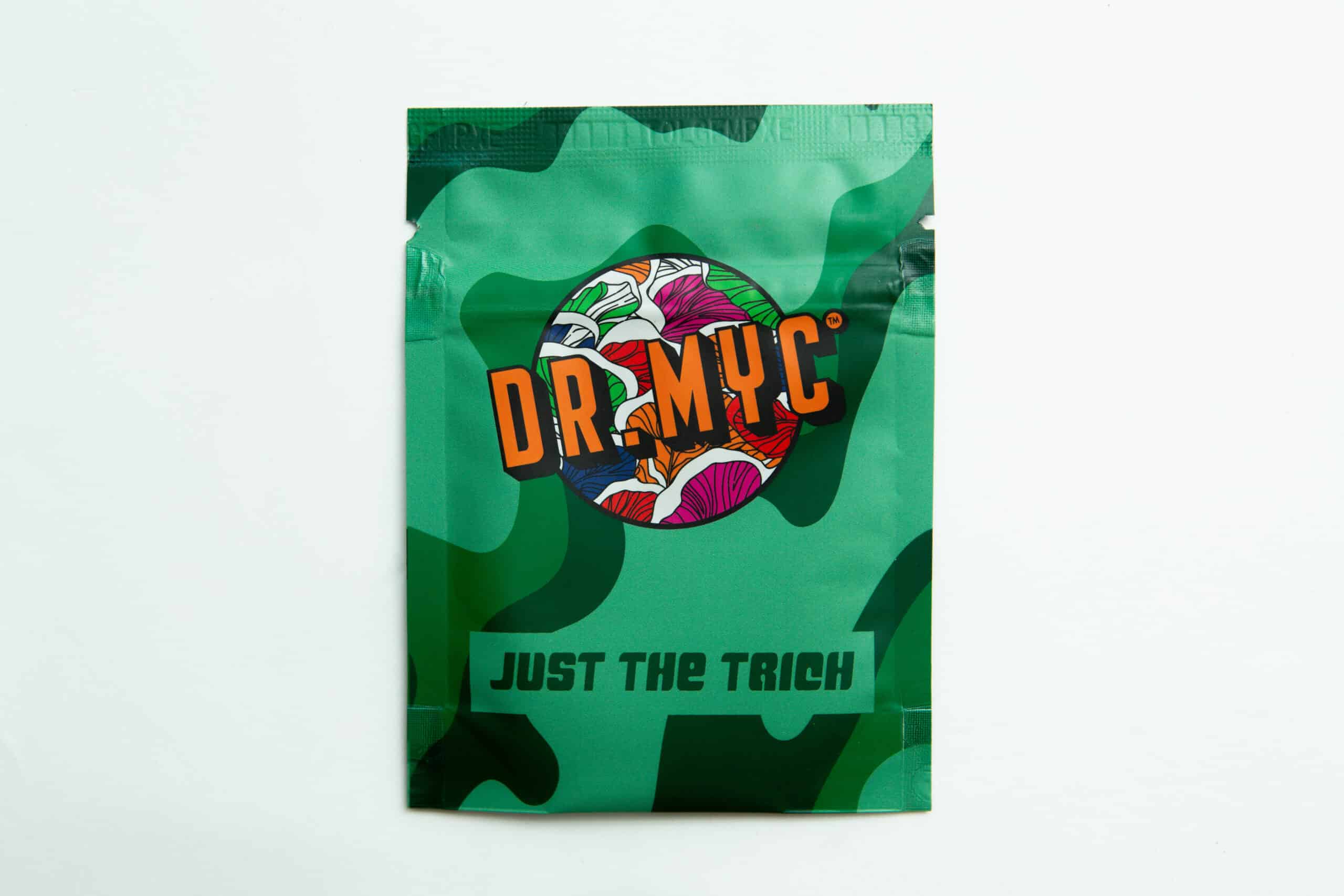 DRMyc Just-the-Trich - For Substrate Vitality 1 Green camo pouch labelled DR. MYC with colourful mushrooms and "JUST THE TRICH" at the bottom, featuring DRMyc Adaptive Liquid Culture Premix for your growing needs.
