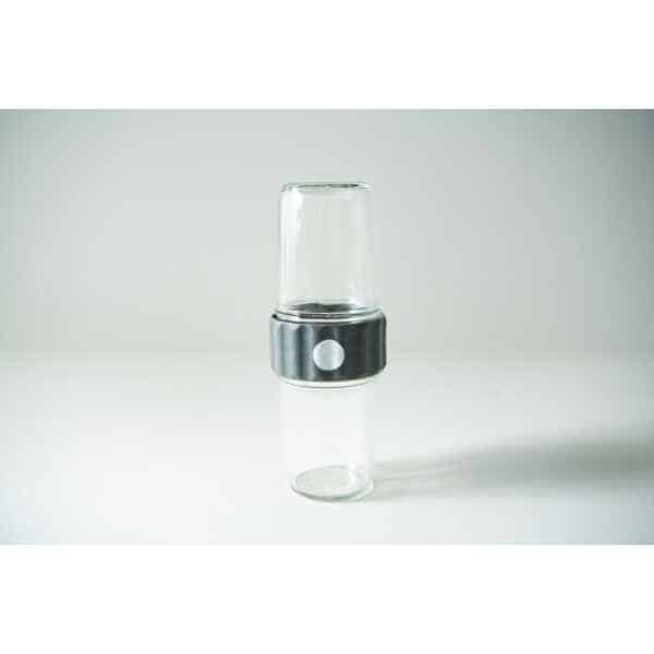 The Plant Cell Biocoupler™ Glass Set (454ml, 340ml, 227ml) features two transparent glass tumblers stacked with a grey ribbed connector around their middles, shown against a white background.