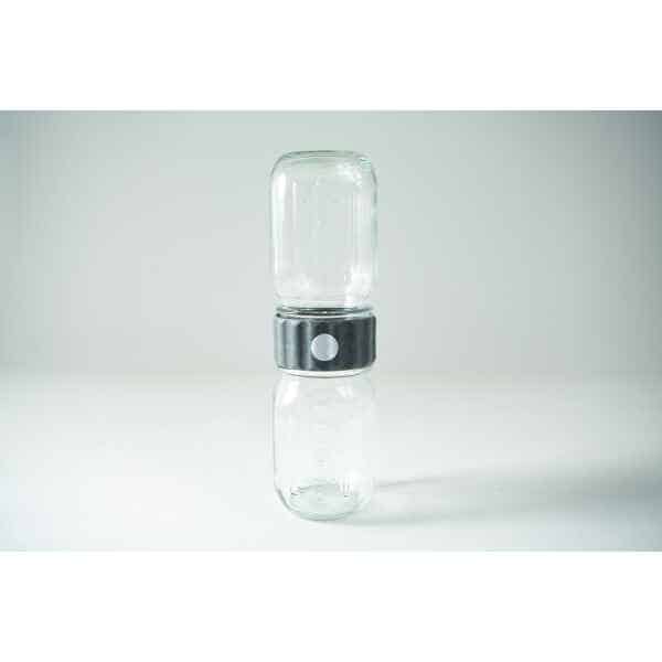 The Plant Cell Biocoupler™ Glass Set (470ml, 355ml, 235ml) features two glass jars vertically joined at their openings with a metal connector, shown against a plain background.