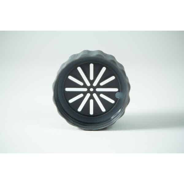 A black round plastic lid with radial slits from the Plant Cell Biocoupler™ Glass Set (16oz, 12oz, 8oz), standing upright on a light surface.