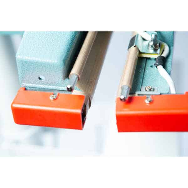 Close-up of the Vertical Foot Heat Sealer VHVD 450mm Double 10mm by Venus, featuring orange end caps and attached wires.