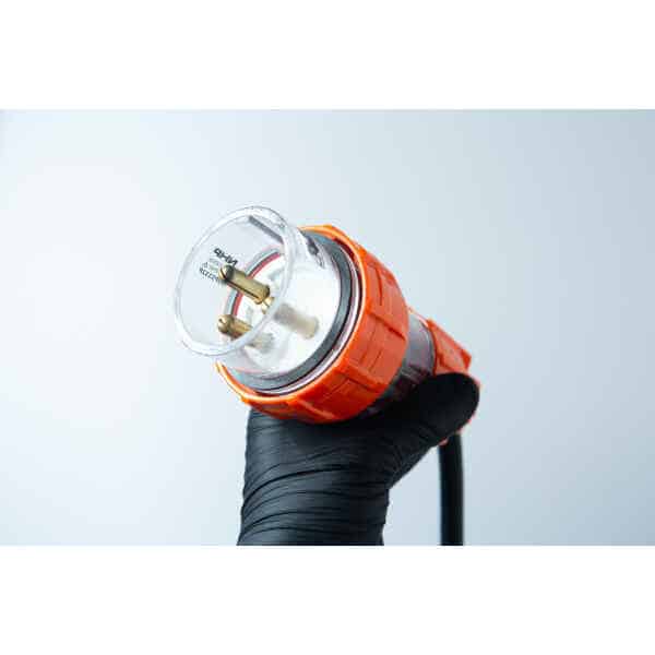 A hand in a black glove holds the Vertical Autoclave 150 Litres (Automatic) | Commercial use | 6KW against a light grey background.