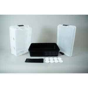 Plastic mushroom growing kit with a black tray, Colonisation Lid, two clear lids, filter discs, and a black filter patch—ideal for growing mushrooms at home.