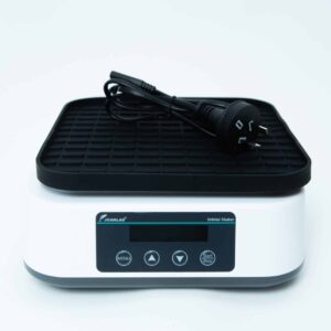 A digital laboratory orbital shaker with a power lead placed on top, on a white background.