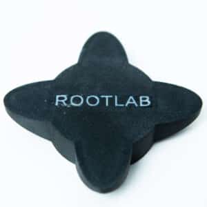 A black, four-pointed object with ROOTLAB written on it, placed on a white background.