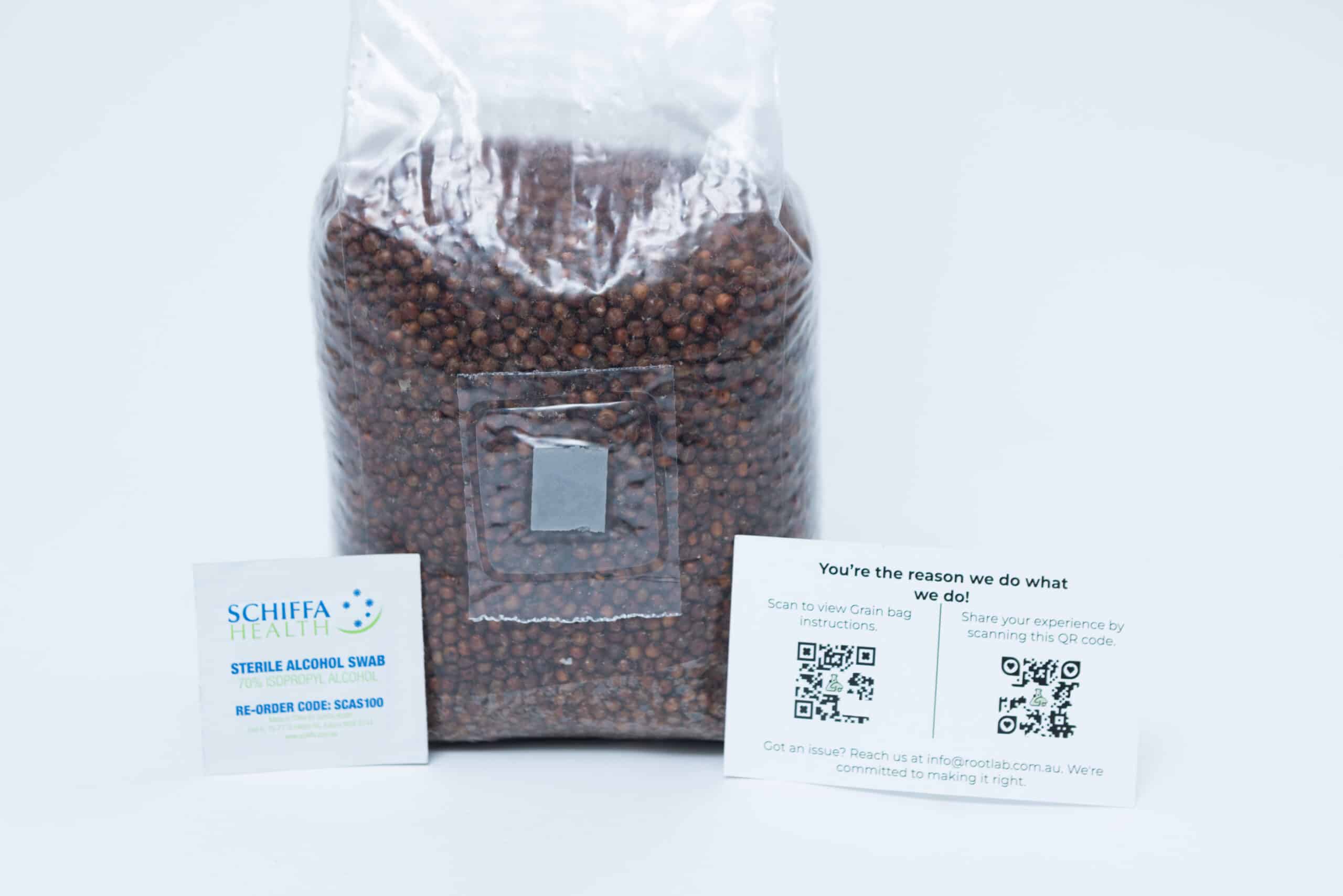 Sorghum(Milo) Pre sterilised for mushroom cultivation w/inj port and air-filter 1kg 3 A sealed bag of brown seeds with an alcohol swab sachet and a customer feedback card on a white background.